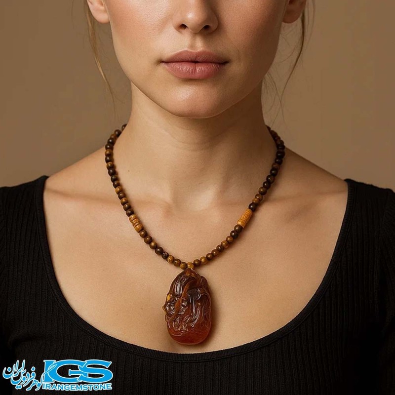 گردنبند سنگ کهربا و چشم ببر با نماد کیسه ثروت فنگ‌شویی – جذب انرژی و ثروت