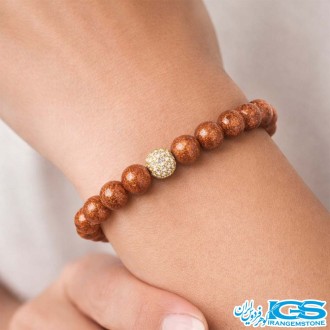 دستبند سنگ دلربا طرح سواروسکی طلایی | آرامش و زیبایی