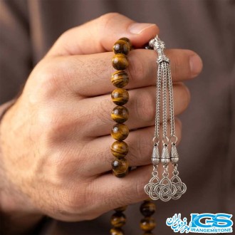 تصویر تسبیح 33 تایی سنگ چشم ببر اصل | زیبا، انرژی‌بخش و معنوی در دست مردانه