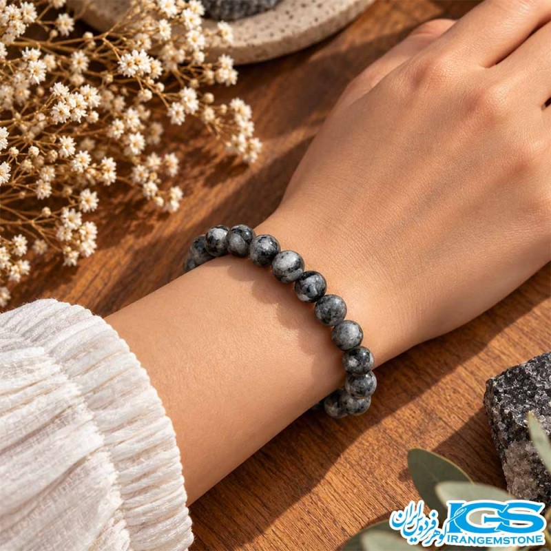 دستبند لاریکیت خاکستری با درخشش آبی کشی