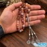 تسبیح چری کوارتز صورتی قرمز ۳۳ تایی