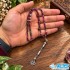 تسبیح تورمالین هندوانه‌ای ۹۹ دانه‌ای با رنگ صورتی و سبز
