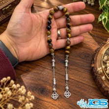 نمای نزدیک مهره ۱۰ میلی‌متری سنگ چشم ببر با جلوه نوری ابریشمی