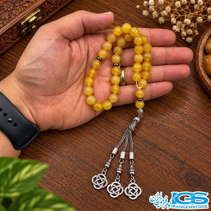 خرید تسبیح عقیق زرد شرف الشمس ۳۳ دانه‌ای از گوهر فردوس ایران