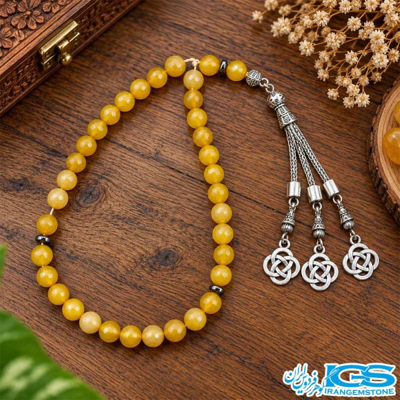 تسبیح شرف الشمس عقیق زرد تراش‌دار ۳۳ دانه‌ای
